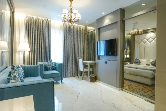 A luxurious hotel room with elegant furnishings.